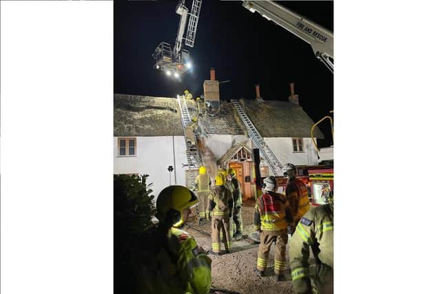 Firefighters from across south Hampshire, including Fareham and Cosham, tackle a thatch fire in Durley 
Picture: Hampshire and Isle of Wight Fire and Rescue Service