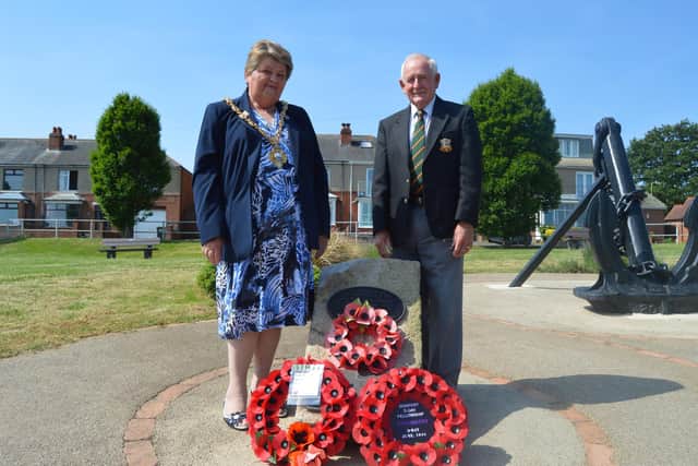 Malcolm Chapman, chairman of the Gosport D-Day Fellowship, right, lays a wreath at Hardway Slipway back in 2018. Picture: David George
