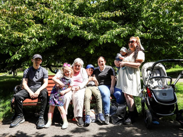 From left, Joe Blagdon, Daysie-Mai, 6, Kath James, Jay, 10, Tina James, and Chelsea Blagdon with Ozzie, 2 months, enjoying the sunshine in Victoria Park, PortsmouthPicture: Chris  Moorhouse (250524-11)