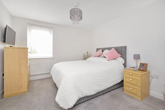 This three bedroom property is on the market at a guide price of £415,000. It is listed by Town and Country.