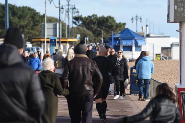 People walking on the seafront today Picture: Simon Czapp/Solent News & Photo Agency