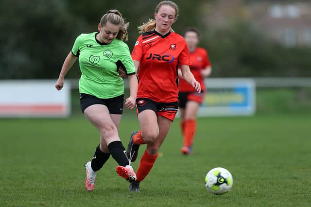 Ella Wilson, right, in action for AFC Portchester during their 10-0 victory over AFC Bedhampton Village in the Portsmouth & District FA Women's Senior Cup earlier this season. Portsmouth Women now await them in the semi-final at Westleigh Park. Picture: Chris Moorhouse