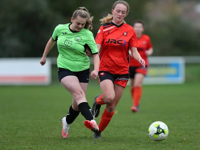 Ella Wilson, right, in action for AFC Portchester during their 10-0 victory over AFC Bedhampton Village in the Portsmouth & District FA Women's Senior Cup earlier this season. Portsmouth Women now await them in the semi-final at Westleigh Park. Picture: Chris Moorhouse