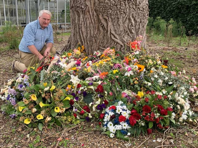Councillor Gerald Vernon-Jackson, with some of the floral tributes. He said: 'It was wonderful to see the flowers that had been laid on the Guildhall steps by residents and visitors in tribute to the Queen. These will now be composted, and the compost used when we plant a tree to remember the Queen, which will be fed with the best wishes of all who laid flowers.'