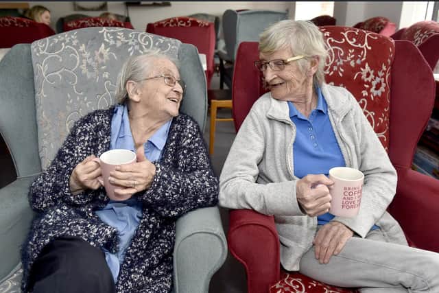 Residents at Raglan Court in Gosport, have been informed that they will experience their service charge and rent increase by a dramatic amount (about £80 roughly a week) and many are going to struggle paying this. 

Pictured is: (l-r) Residents Muriel Smith and Mary Gray chat over a cup of tea in the communual lounge.

Picture: Sarah Standing (070323-953)