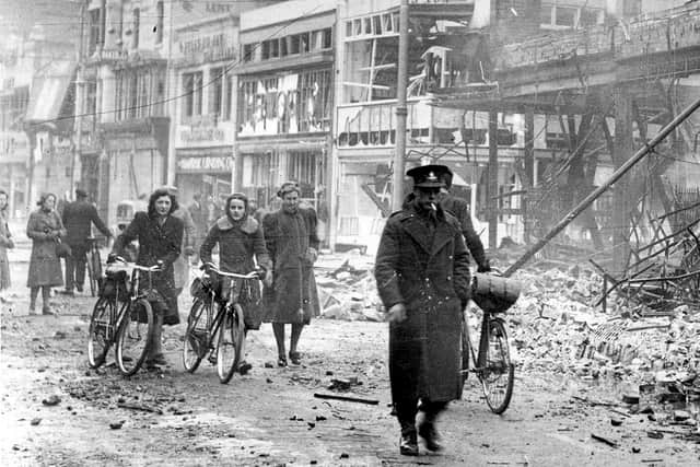 Gillian Timms' mother, Betty Knight and Eileen Mills. Mick Kimber’s father is the soldier. Picture: The News archive