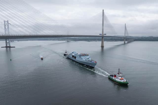 HMS Venturer, the Royal Navy's newest warship making its debut on the River Forth after four years of construction.