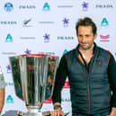 Team Ineos skipper Sir Ben Ainslie, right, with Luna Rossa team director Max Sirena with the Prada Cup at a press conference this week. Photo by Gilles Martin-Raget / AFP via Getty Images.