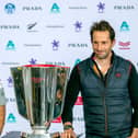 Team Ineos skipper Sir Ben Ainslie, right, with Luna Rossa team director Max Sirena with the Prada Cup at a press conference this week. Photo by Gilles Martin-Raget / AFP via Getty Images.