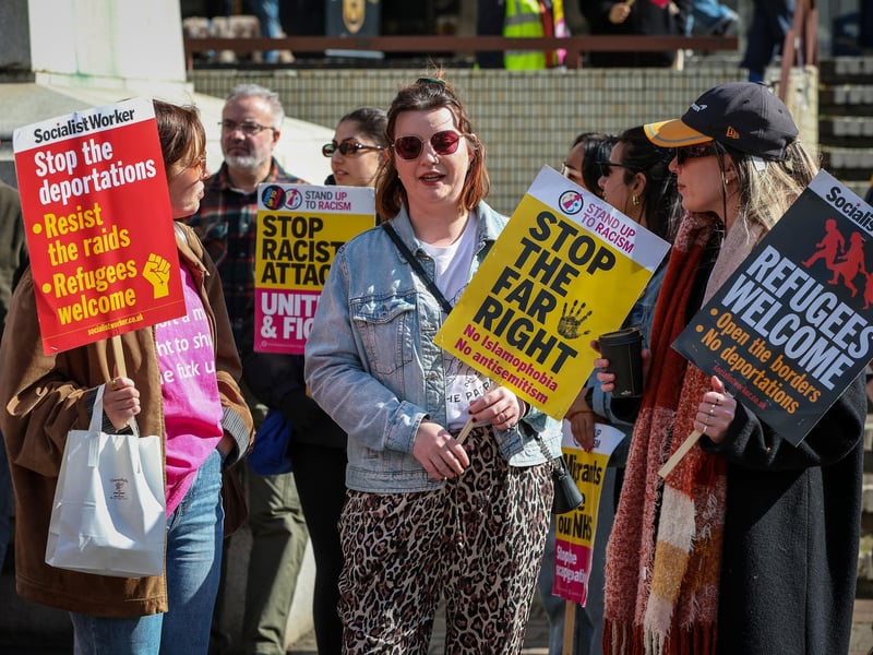 The Unity Rally held up banners saying 'refugees welcome' and 'stop the far right'. Picture: Chris Moorhouse (150325-040)