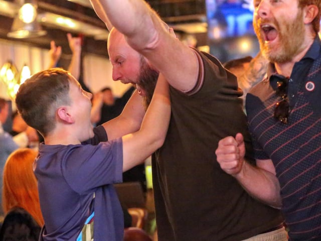 Celebrations at full-time. Fans watch Netherlands v England, UEFA Euros 2024 semi-final played in Dortmund, at Village Hotel, Lakeshore Drive, CoshamPicture: Chris  Moorhouse (100724-102)