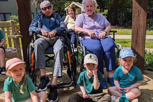 Ancasta Grove residents with children from Woodlands Early Learning.
