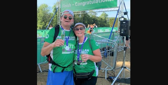 Portsmouth Co-Op manager Steve Collins completed the marathon hike alongside his wife Annie.