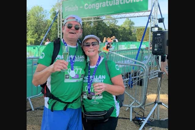 Portsmouth Co-Op manager Steve Collins completed the marathon hike alongside his wife Annie.