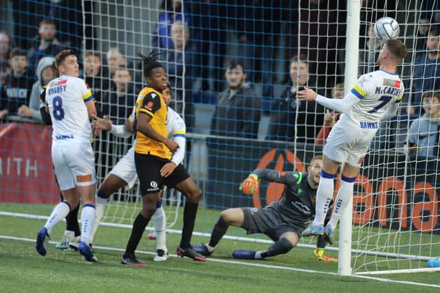 Hawks' Jake McCarthy tries to get his head on the ball from a first half corner. Picture: Dave Haines