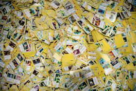 A huge stack of Pokemon cards. Photo by Brendan Smialowski / AFP via Getty Images