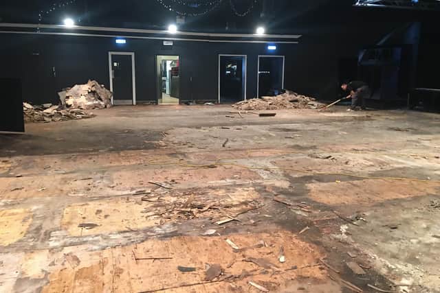 The main room of The Wedgewood Rooms with the floor taken up.