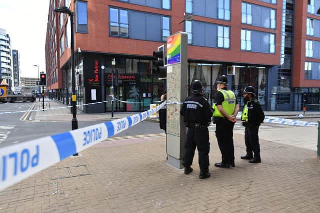 Police officers at a cordon in Hurst Street in Birmingham after a number of people were stabbed in the city centre. Picture: Jacob King/PA Wire