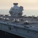 HMS Queen Elizabeth pictured with both US and UK F-35 stealth jets embarked on board. Photo: Royal Navy