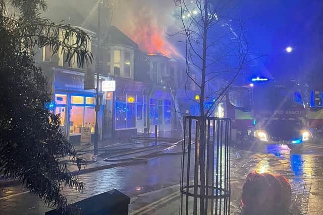 A fire engulfed a flat in Fawcett Road, Southsea, causing the roof to collapse. Picture: Max Lewis.