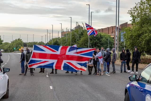 The M275 is brought to a standstill by Anti-immigration protesters. Picture: Mike Cooter (070824)
