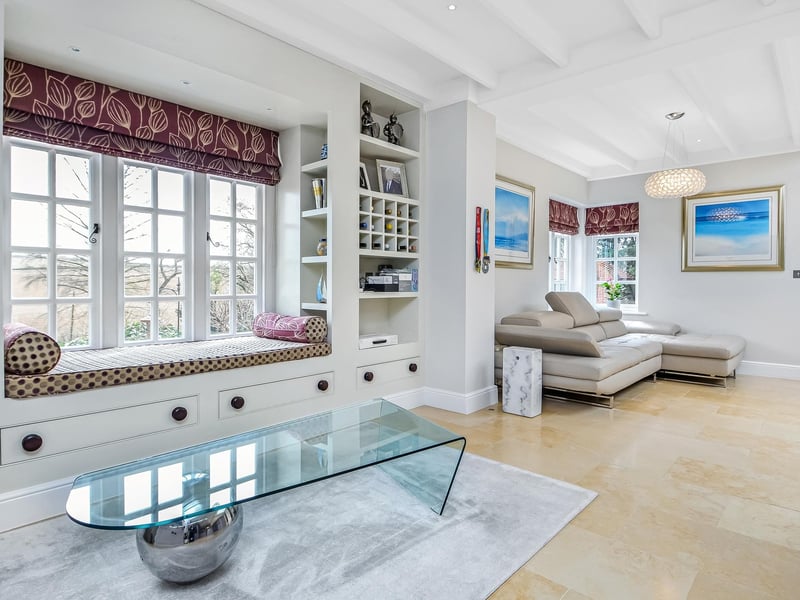 HIghbury Thatch in Hambledon is on the market for £1,895,000 with Fine and Country