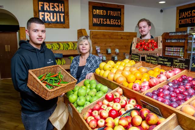 Lee Fruit and Veg. Pictured: Harry Jones and his mother, Karen Jones and Joshua Woodward.
Picture: Habibur Rahman