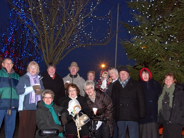 Mansfield Woodhouse Christmas lights switch on.
Organisers and visitors to the lights switch on gather around the Christmas tree in 2010.