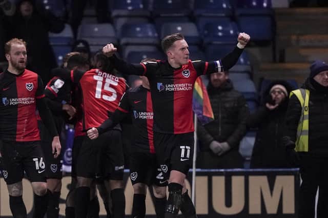 Pompey captain Ronan Curtis celebrates at Gillingham.