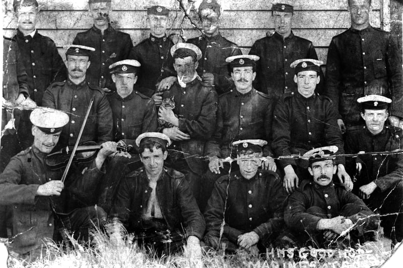 Taken at HMS St Vincent circa 1910 are some of the Royal marines that served on HMS Good Hope which was sunk at the battle of Coronal off the Falklands in 1914.
Sent in by Mrs Phyllis Brooks nee Dwyer of Alverstoke it shows her late father Ernest Joseph is seen middle centre with the cat.



nos 1505