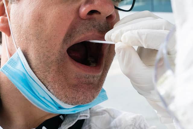 A man gets a Covid-19 quick test. Picture: GEORG HOCHMUTH/APA/AFP via Getty Images