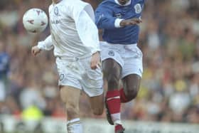 Paul Hall challenges Leeds' Gunner Halle in Pompey's 3-2 FA Cup win at Elland Road in February 1997. Picture: Anton Want/Allsport
