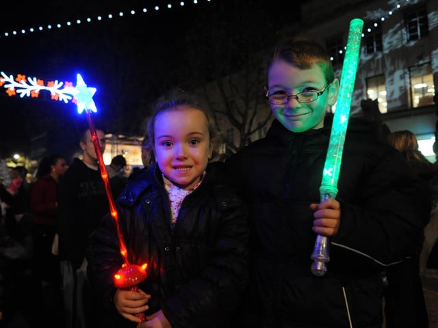 Abigail Childs (five), and Christopher Martin (seven), from Landport watch the Christmas lights switch on in Commercial Road in 2009. Picture: Ian Hargreaves (094172-8100)