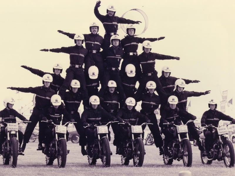 On six motorbikes, the ever impressive Royal Signals White Helmets motorcycle display team in action at the Southsea Show, 1993. The News PP5210