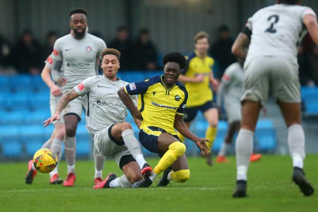 Billie Busari is tackled. Picture: Chris Moorhouse