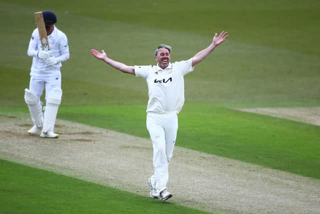 Rikki Clarke celebrates dismissing Ian Holland. Photo by Jordan Mansfield/Getty Images for Surrey CCC.