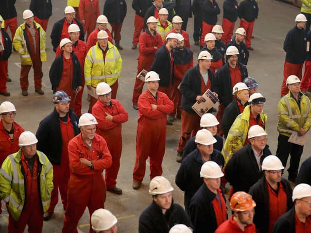 Dreadnaught-class submarines are built at the Cammell Laird shipyard in Birkenhead, Merseyside, for the Royal Navy. The MoD have responded to concerns that upcoming industrial action may slow down projects. Pictured are shipyard workers at the keel-laying ceremony of the new polar research ship, RRS Sir David Attenborough, on October 17, 2016. Picture: Christopher Furlong/Getty Images.
