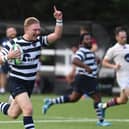 Jacob Knight points skywards as he heads over for a debut try. Picture: Neil Marshall