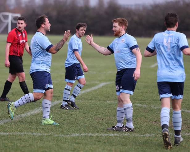 Josh Dean, left, has just scored for Portchester Rovers. Picture: Sam Stephenson