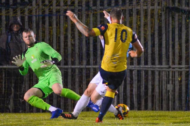 This Steve Hutchings shot was deflected for a corner. Picture: Martyn White