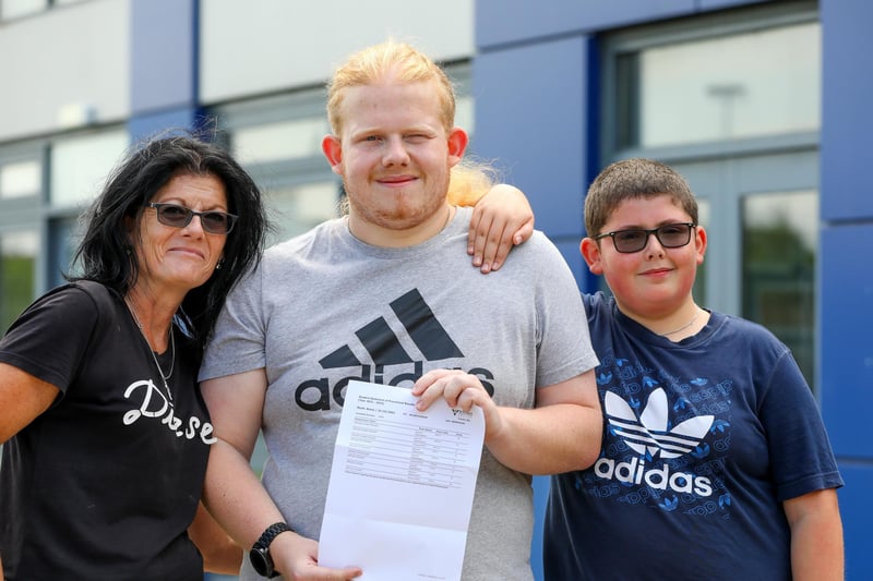 Pictured: Reece Myatt, centre, with his mother Tina and his brother Marley. Reece has achieved Distinction*, Distinction and Merits and is going to read Earth Sciences at the University of Portsmouth. 
Picture: Chris Moorhouse (jpns 170823-20)