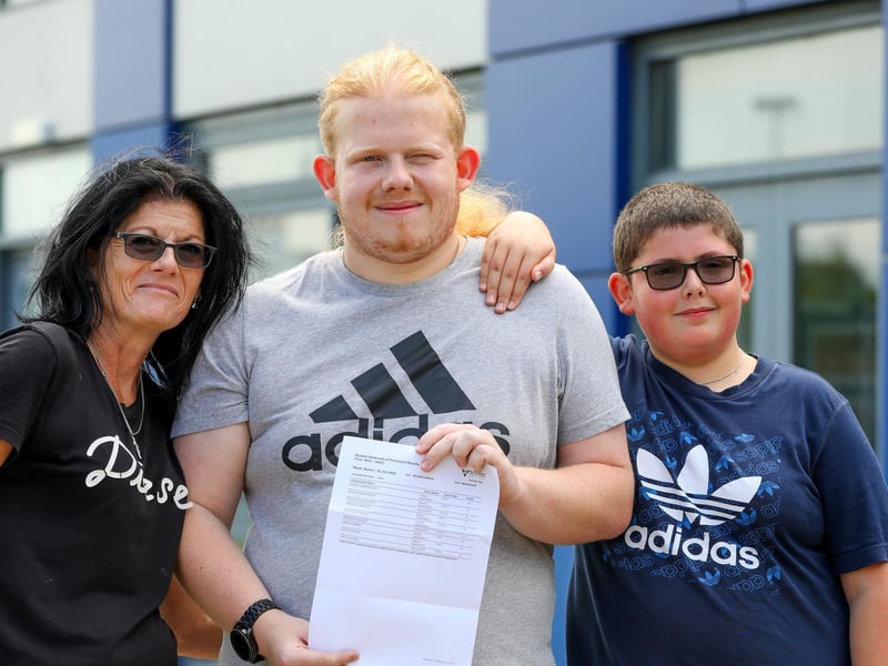 Pictured: Reece Myatt, centre, with his mother Tina and his brother Marley. Reece has achieved Distinction*, Distinction and Merits and is going to read Earth Sciences at the University of Portsmouth.
Picture: Chris Moorhouse (jpns 170823-20)