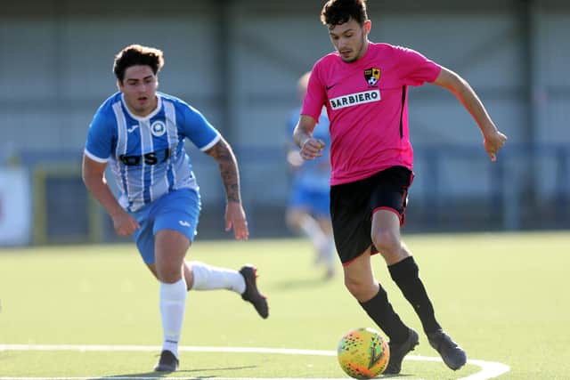Harry Gregory (pink) scored a hat-trick as AC Trades thrashed Portsville Park 13-4 in the Adelaide Cup. Picture: Chris Moorhouse