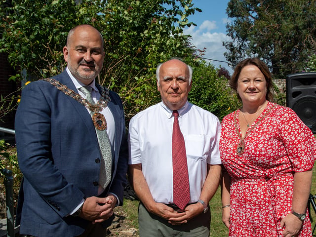 Councillor Fred Birkett (Mayor of Fareham) with Abbeyfield Chairman Dr Parviz Daneshvar and Lisa Birkett (Mayoress of Fareham) at the garden party. Picture: Mike Cooter (080723)