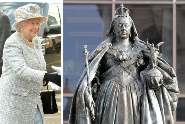 HM Queen Elizabeth II, and the Queen Victoria statue in Guildhall Square, Portsmouth