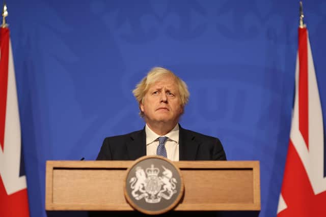 Prime minister Boris Johnson during a press conference in London's Downing Street after ministers met to consider imposing new restrictions in response to rising cases and the spread of the Omicron variant. Picture date: Wednesday December 8, 2021.