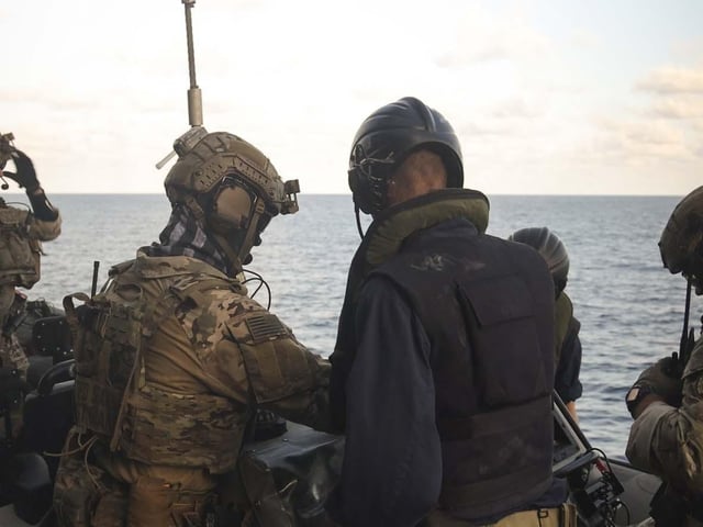 HMS Dauntless conducting a drugs intervention/rescue mission whilst operating in the Caribbean region.