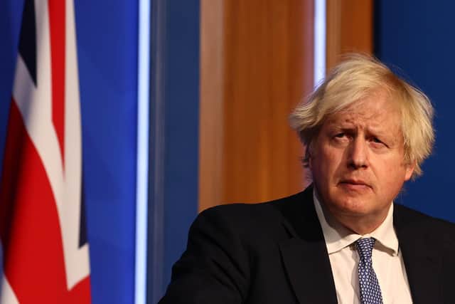 Prime Minister Boris Johnson during a press conference in London's Downing Street. Pic Adrian Dennis/PA Wire