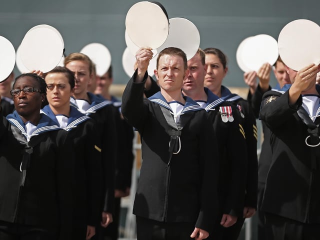 Company of the HMS Illustrious stand in formation during her decommissioning ceremony on August 28, 2014 in Portsmouth. Photo by Dan Kitwood/Getty Images