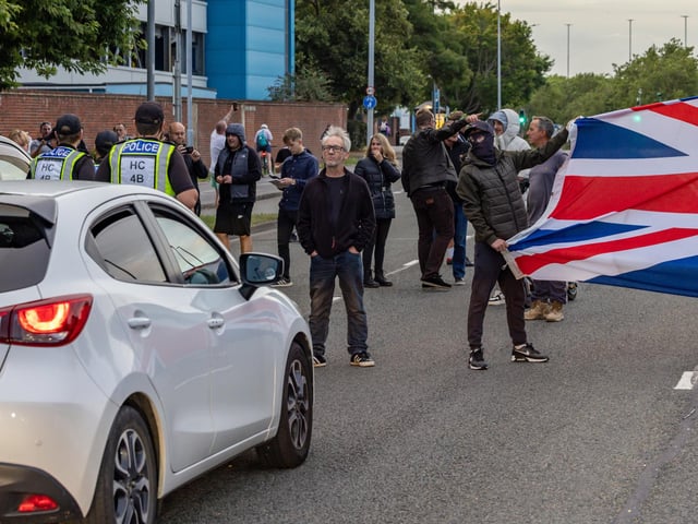 The M275 is brought to a standstill by Anti-immigration protesters. Picture: Mike Cooter (070824)
